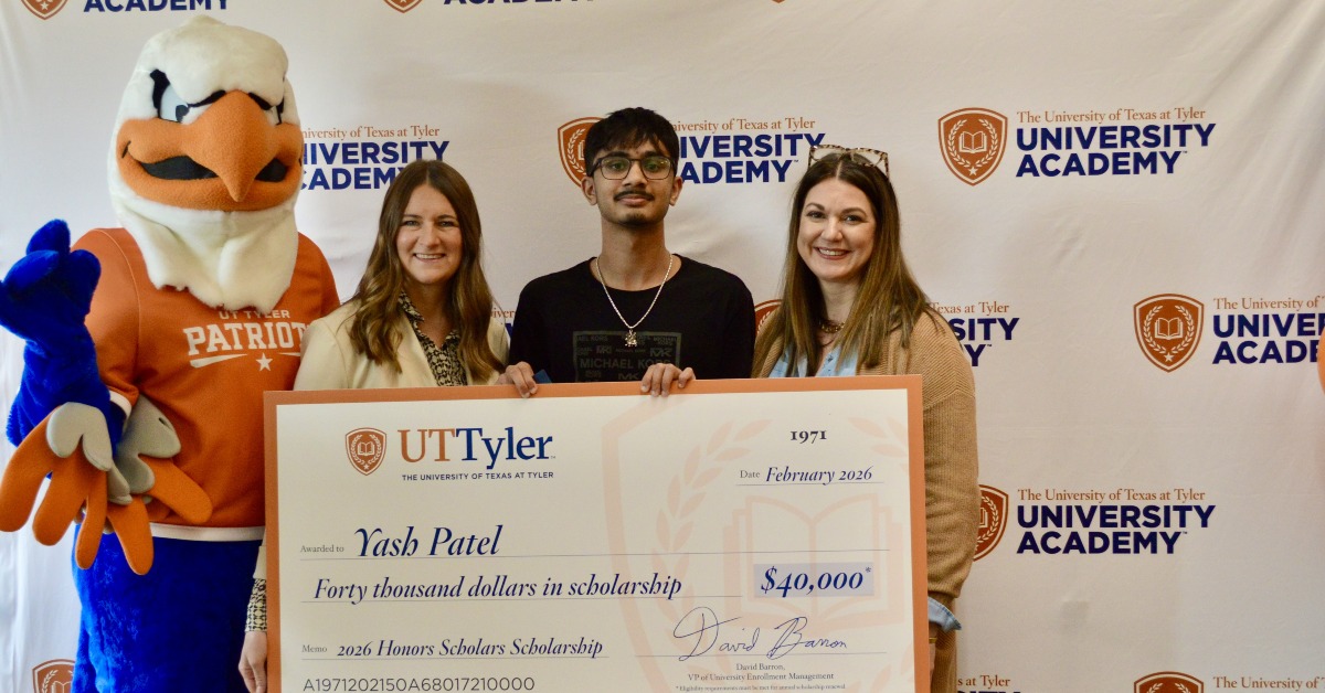 student with scholarship presentation