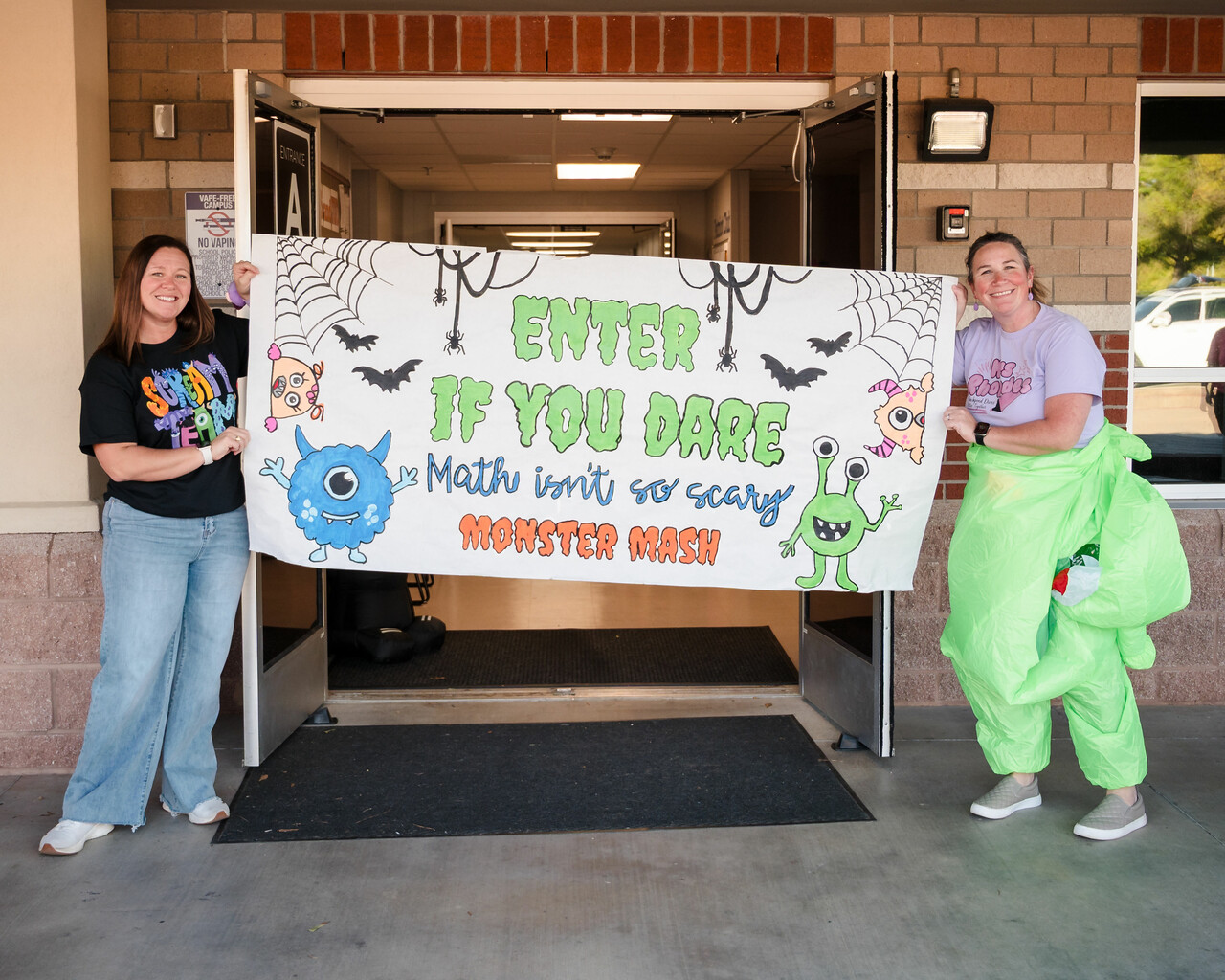 teachers greeting students