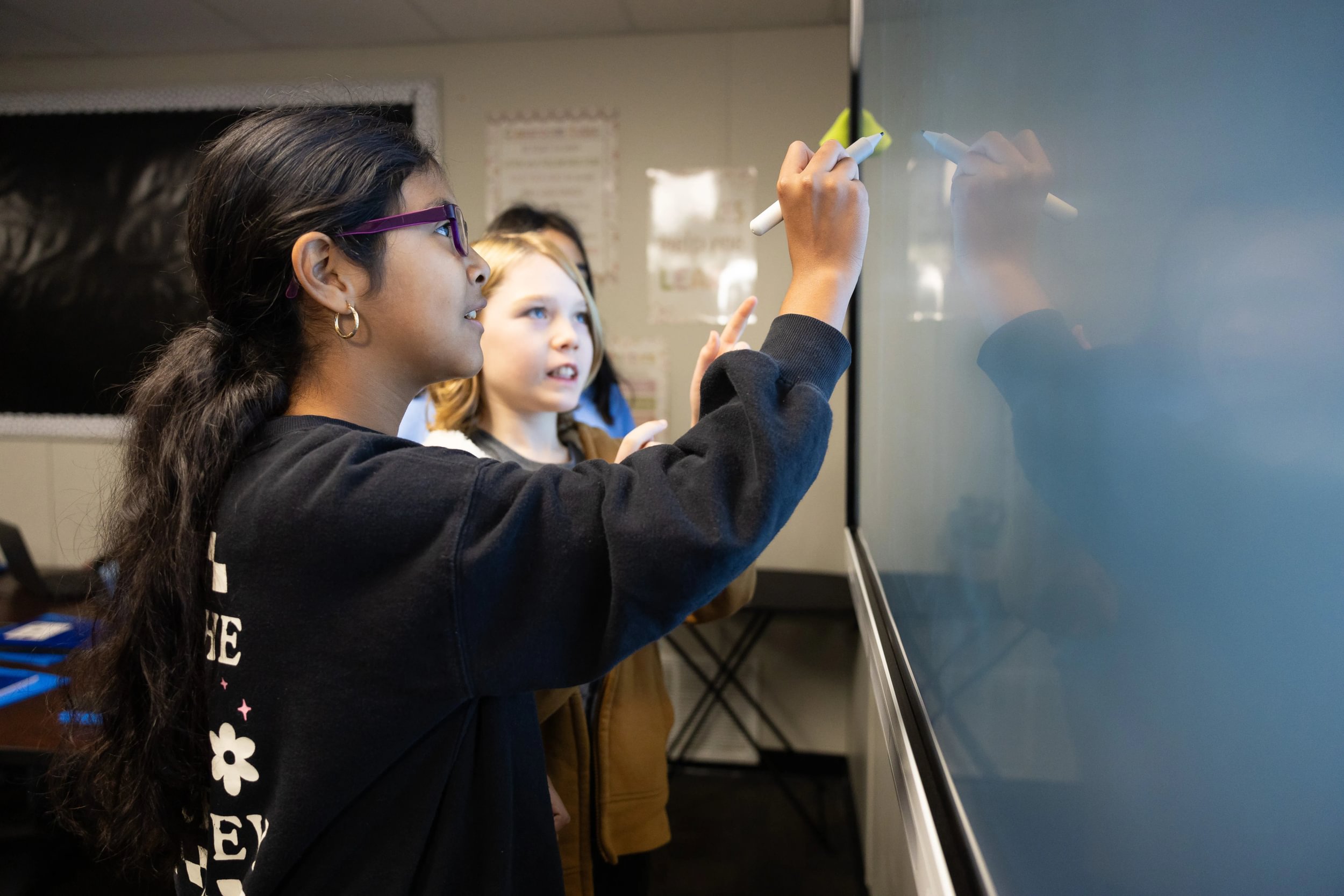 students at smart board